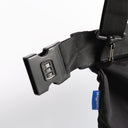 Close-up of a black bag with a combination lock and 'headfirst' brand tag on a white background. headfirst anti theft & water repellent helmet bag 4